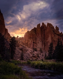 The last bit of light squeaking through stormy clouds at Smith Rock Oregon  IG mattfloresfoto
