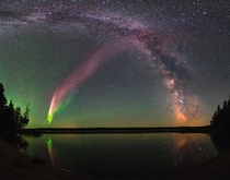 The majestic aurora-like phenomenon Steve with the Milky Way Childs Lake Manitoba Canada Image credit Krista Trinder