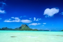 The many blues of beautiful Bora Bora shot from Paul Gauguin Cruises private beach last week 