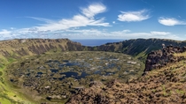 The mile-wide crater lake of Easter Islands extinct Rano Kau volcano  photo by Greg Ness