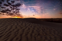The milky way moonrise and sand dunes in the Great Sandhills in Saskatchewan 