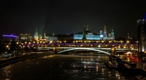 The Moscow Kremlin and Bolshoy Kamenny bridge at night 