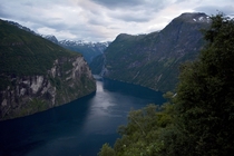 The most gorgeous Geirangerfjord Norway stood there still the water looked still like a block of ice so very deep 