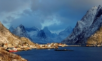 The Norwegian village of Reine as the sun is coming up in the morning 
