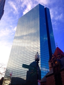 The October Sky reflecting in the John Hancock Tower in Boston MA 
