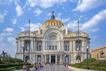 The Palacio de Bellas Artes Palace of Fine Arts Mexico City was designed by Mexican architect Federico Mariscal and was completed in 
