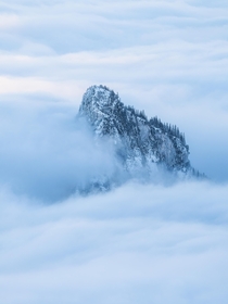 The rock in the clouds Roter Stein Austria 