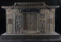 The sarcophagus of Wirkak an -year-old Sogdian caravan leader  CE This Iranian culture was among the most important merchant societies on the Silk Road The tomb imitates Chinese domestic architecture and the epitaph is bilingual Studded doors are flanked 