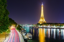 The Seine and Eiffel Tower after dark - Paris France 