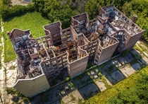 The shell of an abandoned apartment complex that suffered a fire years ago