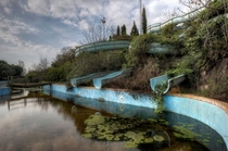 The slides of an abandoned water park 