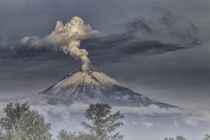 The smoking Popocatepetl volcano in Mexico  by Cristobal Garciaferro Rubio
