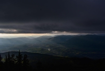 The sun piercing through the clouds from Pilchuck mountain in WA OC x
