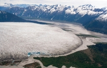 The tongue of the absolutely enormous Taku Glacier  Near Juneau AK it has been measured at  feet  m thick about  kilometres  mi long