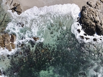 The turquoise waves of Heart Shaped Rock Beach Monterey California USA 