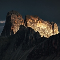 The Wall Dramatic light on a peak in the Dolomites shortly before a thunderstorm  Photo by Kilian Schnberger