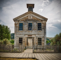 The western United States landscape is dotted with abandoned towns This schoolhouseMasonic meetinghouse is one of the few preserved buildings in the ghost town of BannackMT