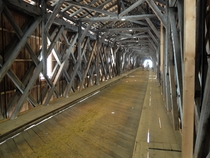 The wood construction of an old bridge over the Rhine in Vaduz LiechtensteinSwitzerland 