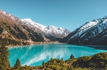 Theres a beautiful lake in Alberta Canada thats heavily photographed Im sorry to inform you this isnt that lake Big Almaty Lake in Kazakhstan 