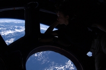 Theres no place like home Peering out of the windows of the International Space Station astronaut Tracy Caldwell Dyson takes in the planet on which we were all born and to which she would soon return About  km up the ISS is high enough so that the Earths 