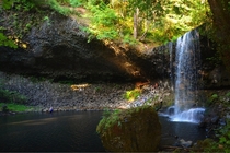 Theres  people in this picture Tis a big place Beaver Falls Rainier OR photographer by Kyle Wishard 