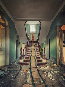 These stairs once heard the patter of childrens feet and peals of laughter Now they slowly decay in silence Photo by Matthias Haker 