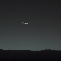 This amazing photo was actually taken from Mars Yup the planet Mars and that tiny star-like white dot there is our beloved Earth