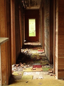 This colorful carpet was made of small squares of sample carpets stitched together The house caved in a few years ago and is no longer accessible Great Smoky Mountains National Park Tennessee