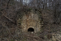 This is an old limestone kiln in Pike County Illinois Its listed on the National Register of Historic Places Its not easy to find and is completely overgrown this time of year I shot this last winter x 