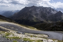 This is what Tour De France Cyclists see when they reach the top of Galibier On background you can see the Barre des crins