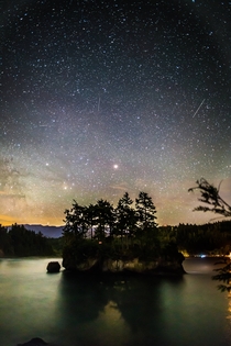 This lovely island captured my attention for most of the night Here is Mars rising over the Salt Creek Campgrounds in Washington State 