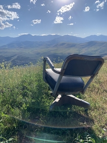 This single rusted chair abandoned on the top of a mountain Interesting find at the end of my hike