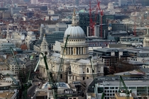 Three hundred year old St Pauls Cathedral surrounded by new construction 
