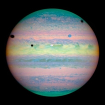 Three moons cast shadows on jupiter taken by the NASA Hubble space telescope 