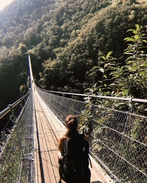 Tibetan Bridge Carasc in Switzerland is a  m long and rises  m above the ground
