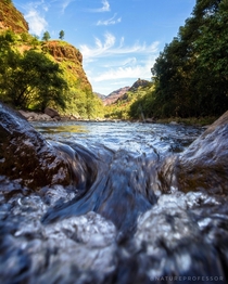 To get to the campsite took crossing this river several times which was fun What was not fun was losing my means of communication while I was recording how to properly cross a flowing river oof Kauai Hawaii 