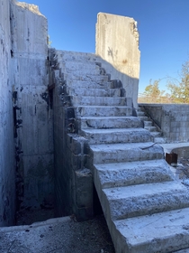 Today is my  year anniversary and wifey and I saw what looked like a massive house up the mountain so we drove up to check it out and realized it was abandoned Of course I had to take a look so walk these stairs with me and Ill try to post more photos in 