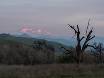 Todays alpenglow at Sierra Nevada Lasted for mere seconds glad I stopped in the middle of the road to take the picture 