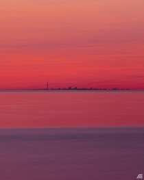 Toronto skyline sunset from opposite side of Lake Ontario