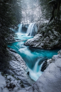 Tucked away is Washington is one of my favorite waterfalls especially when it snows OC  ross_schram