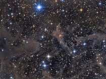 Unique clouds in the Milky Way - Diffuse nebulae LBN and LDN surround a small orange reflection nebula Cohen  
