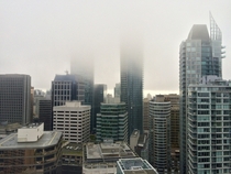 Vancouver Canadas tallest towers disappearing into the clouds 