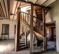 Very cool double spiral staircase in an abandoned house