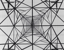 View from directly beneath an electrical transmission tower 