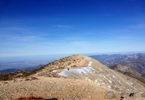 View from the top of mount baldy Incredible theres still show on the peak in early May Taken with iPhone 