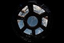 view of Earth as seen from the Cupola on the Earth-facing side of the ISS