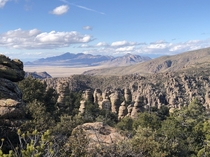 View of the hoodoos and mountains from Heart of Rocks Loop in Chiricahua National Monument Arizona 