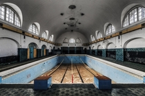 Water Shortage - the lane dividers are still left hanging in an abandoned swimming pool at a former Soviet barrack Berlin photo by xflo  w