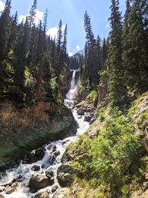 Waterfall in forest Barskoon Gorge Kyrgyzstan 