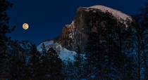 Waxing moon rising beside Half Dome in Yosemite NP Feb   